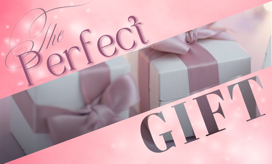 An elegant display of gift bixes with pink ribbon on a soft pink background with the halves of a pink gradient with the text "the perfect gift"