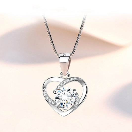 Crystal Heart Necklace — Sterling Silver Swirl Pendant