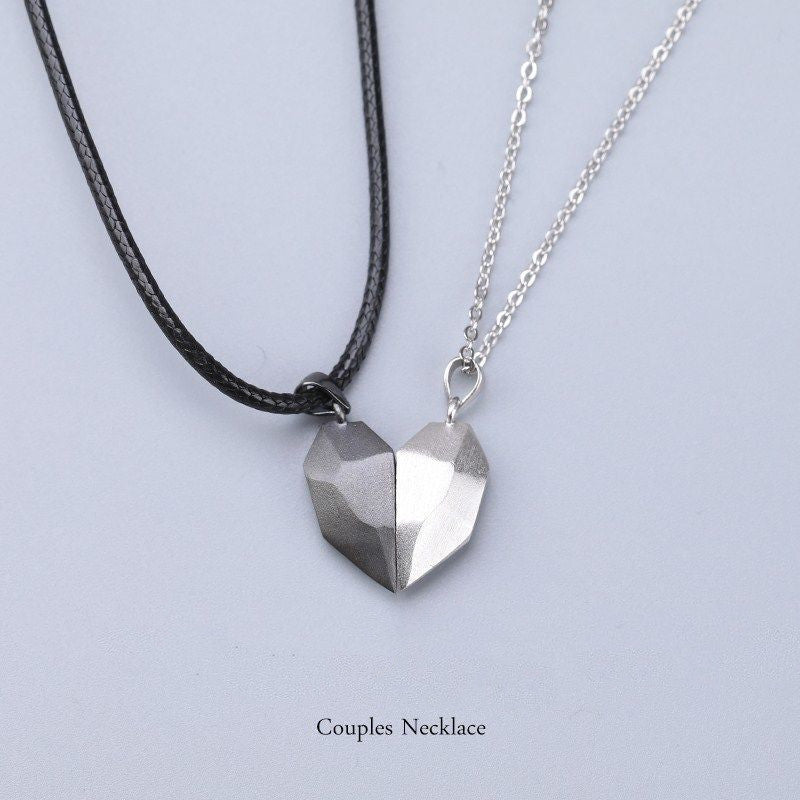 Heart-Shaped Magnetic Couple Necklace – Black & Silver Pendant Set Aura Rene