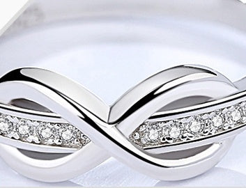 S925 Infinity Knot Ring with Crystal Accents Aura Rene