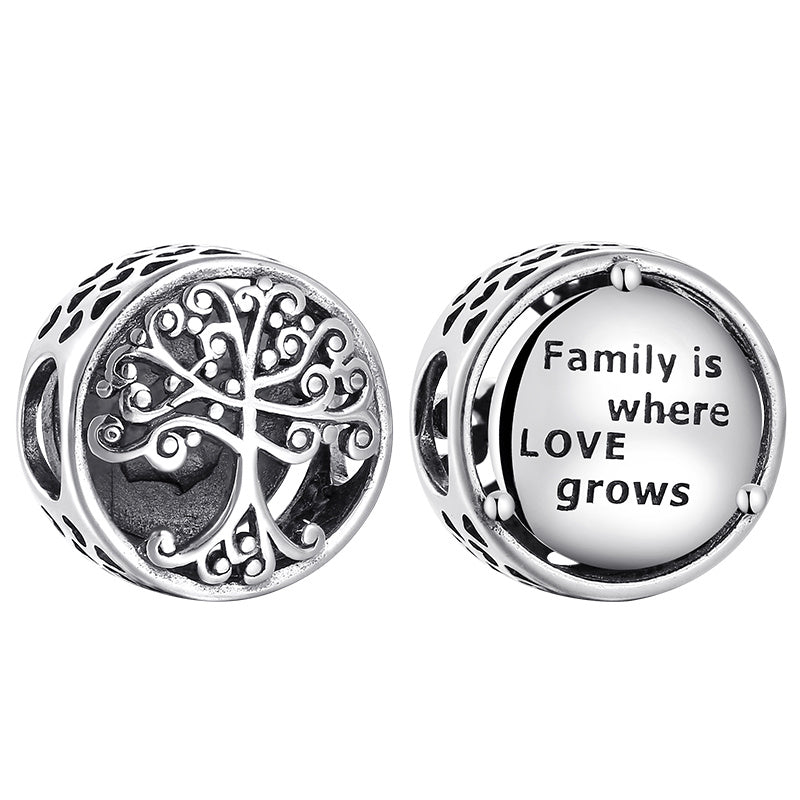 Two silver charms with a tree design and 'Family is where LOVE grows' text on a white background.