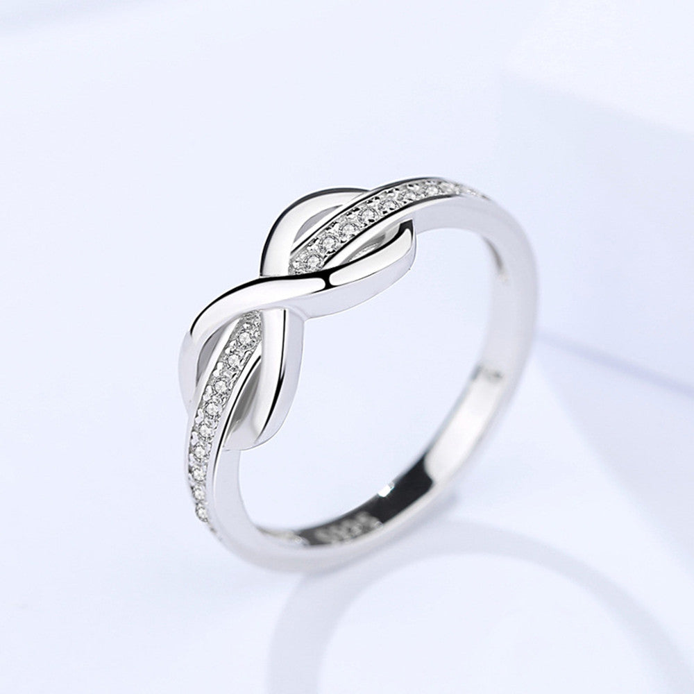 S925 Infinity Knot Ring with Crystal Accents Aura Rene