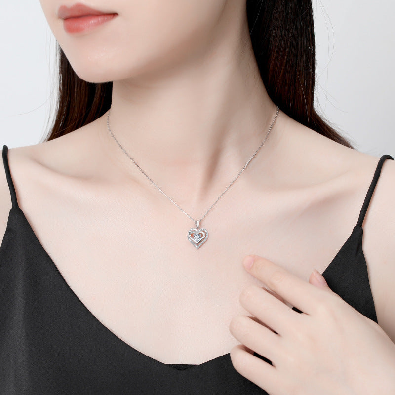 Eternal Spark Crystal Heart Pendant — Sterling Silver Elegance