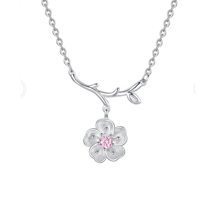 Pink floral sterling silver necklace featured in The Aura Edit