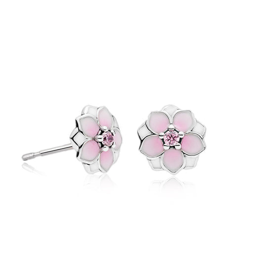 Flower-shaped earrings with pink centers on a white background