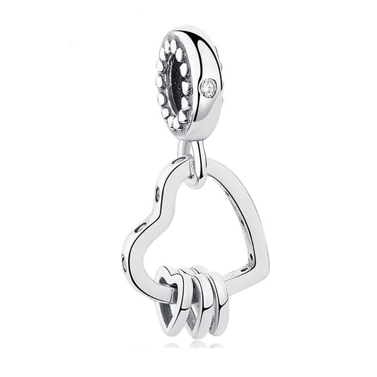 Silver heart-shaped pendant with a key design on a white background