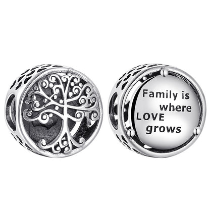 Two silver charms with a tree design and 'Family is where LOVE grows' text on a white background.