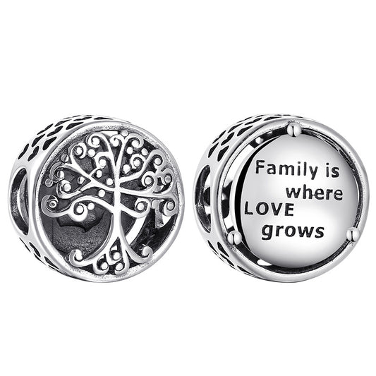 Two silver charms with a tree design and 'Family is where LOVE grows' text on a white background.