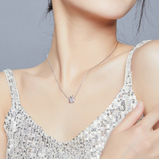 Supplier photo showing the ladybug necklace worn with a V-neck top; placement varies by wearer.