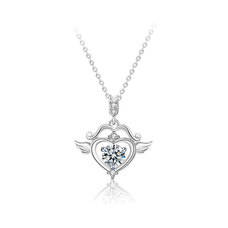 Heart-shaped pendant with wings on a white background