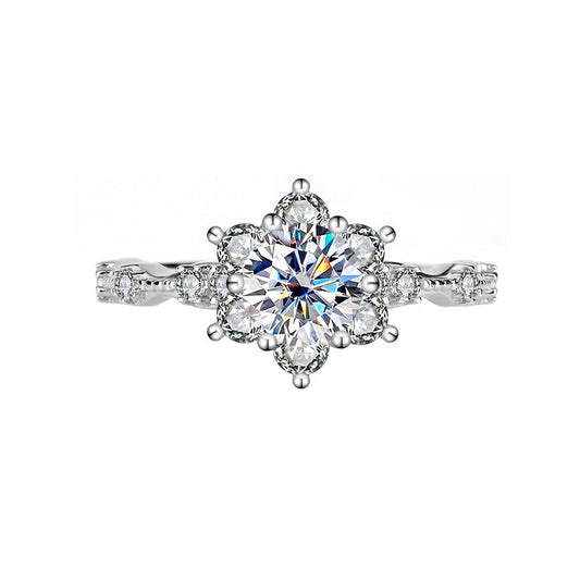 Diamond ring with a floral design on a white background