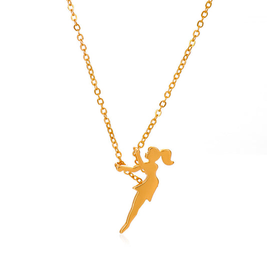 Gold necklace with a fairy pendant on a white background