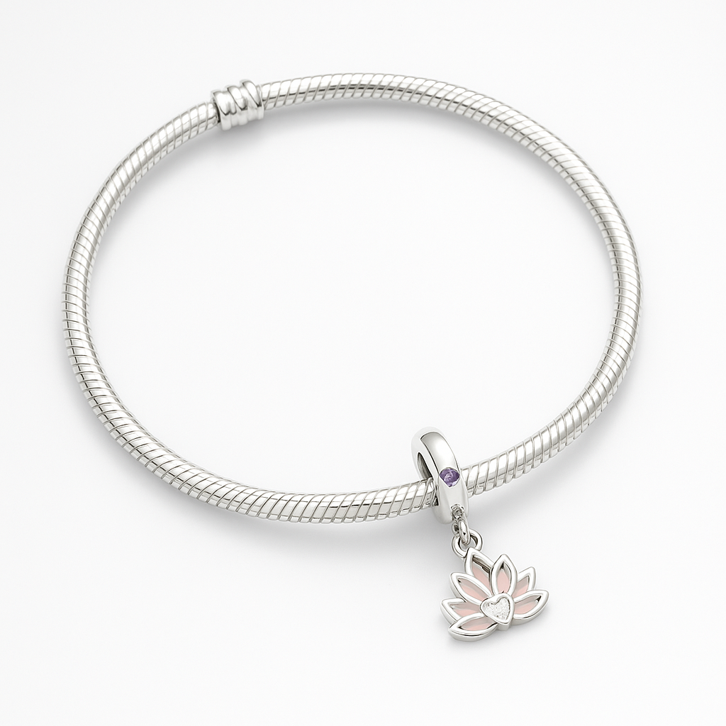 Silver bracelet with a lotus flower charm on a white background